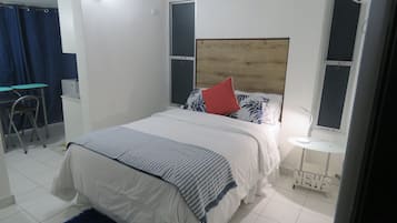 Executive Studio | Individually furnished, desk, blackout drapes, soundproofing