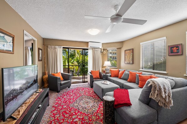 Deluxe Apartment | Living room | 60-inch flat-screen TV with digital channels, Smart TV, Netflix - Asiatic Suite at Nautilus Mooloolaba (Mooloolaba)