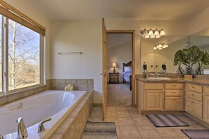 Bathtub, jetted bath, hair dryer, towels
