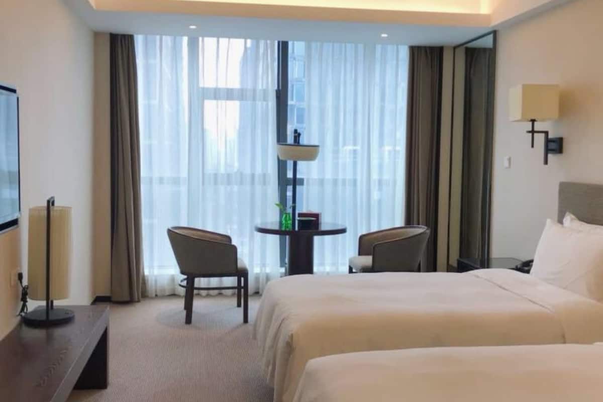 Deluxe Twin Room | 1 bilik tidur, peralatan tempat tidur premium, gebar bulu kapas