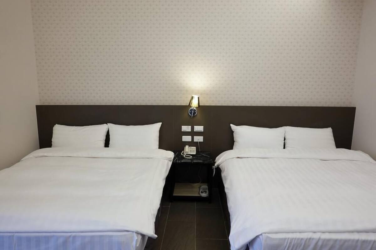 elite quadruple room | desk, blackout curtains, soundproofing, free wifi