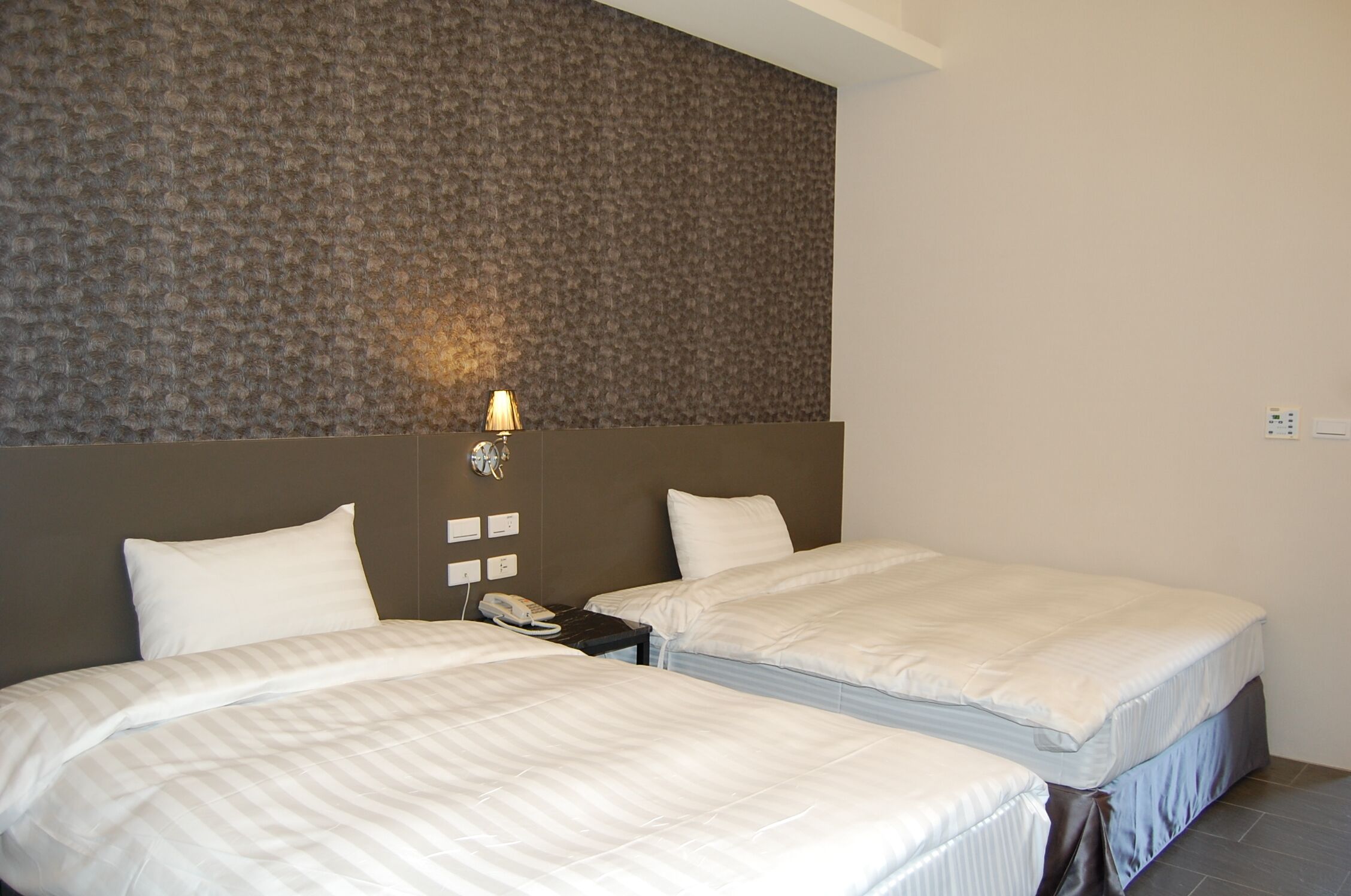 elite twin room | desk, blackout curtains, soundproofing, free wifi