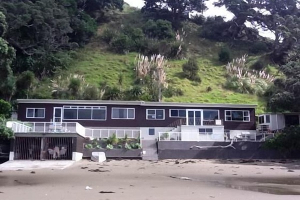 Bach on the right hand side stand on the beach