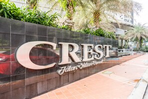 Welcome to Crest, located on Jalan Sultan Ismail, surrounded by lush greenery.