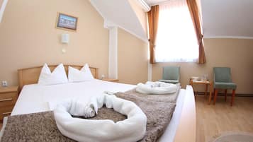 Habitación triple | Minibar, cunas gratuitas y wifi gratis