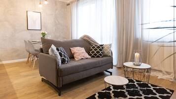 Apartment (Zamkowa 4) | Living area | Flat-screen TV