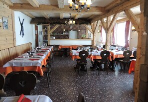 Breakfast, lunch, dinner served; local cuisine