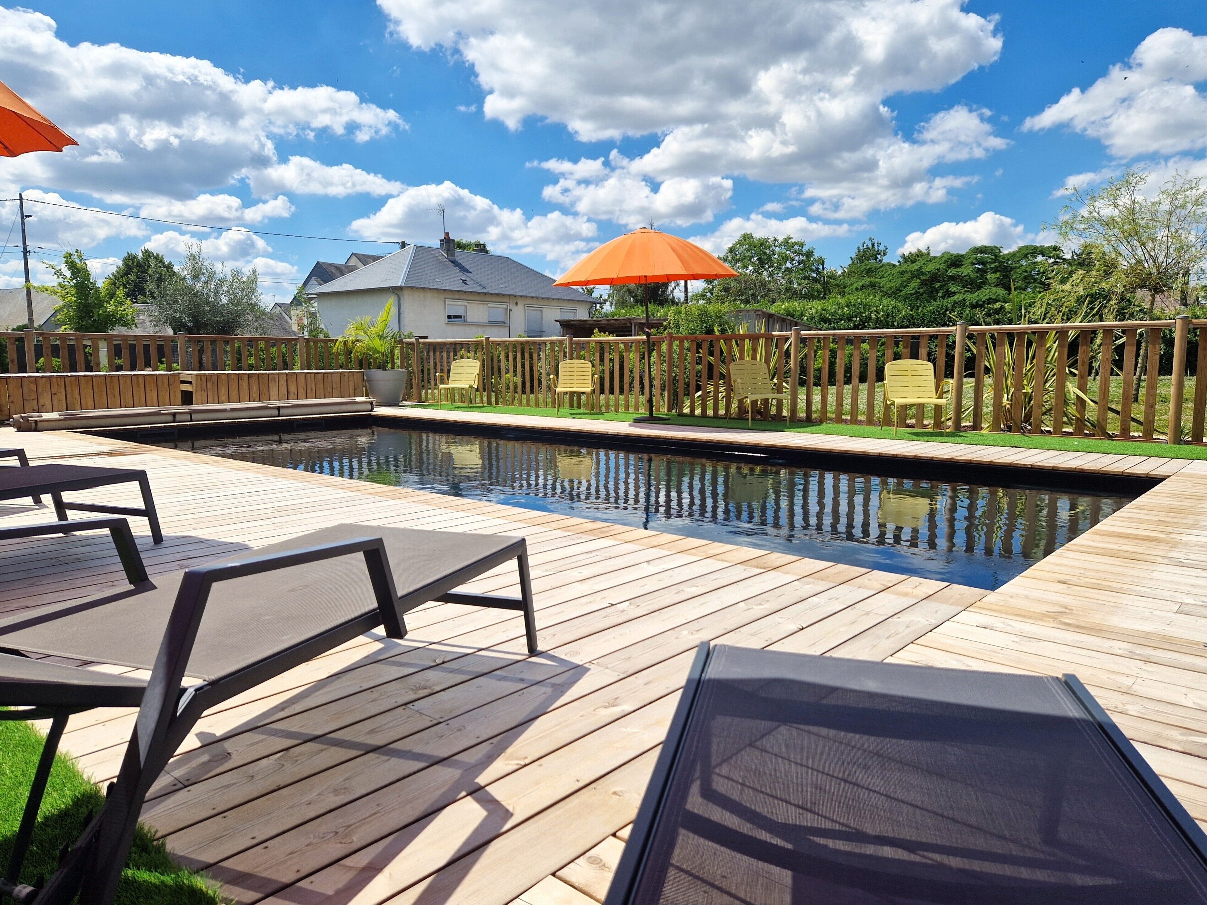 seasonal outdoor pool, open 10:00 am to 7:00 pm, pool umbrellas