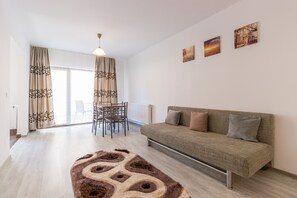 Suite Classique | Coin séjour | Télévision à écran plat