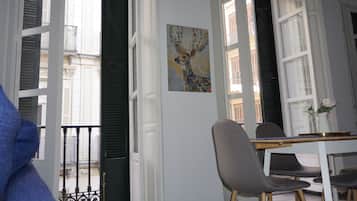 Design Loft, 1 Queen Bed with Sofa bed, Balcony, City View | Living room | 49-cm flat-screen TV with digital channels, Smart TV