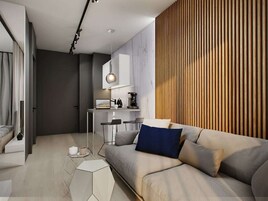 Deluxe Apartment | Living room | Flat-screen TV, heated floors