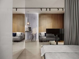 Deluxe Apartment | Living area | Flat-screen TV, heated floors