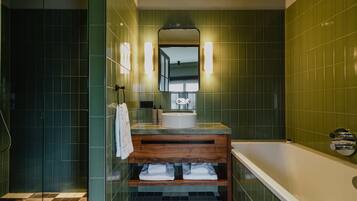 Shower, rainfall showerhead, designer toiletries, hair dryer