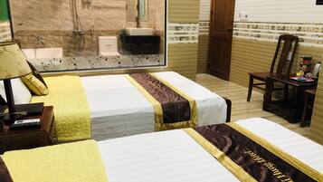 Quadruple Room | Minibar, desk, laptop workspace, blackout drapes