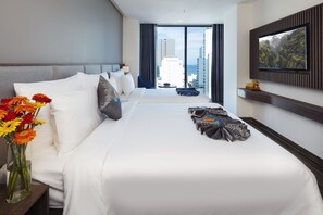 Deluxe Triple Room, City View | Premium bedding, minibar, in-room safe, desk - Amber Hotel (Nha Trang)