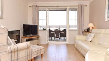 Apartment | Living area | Plasma TV, fireplace, DVD player