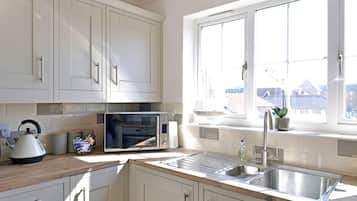 Apartment | Private kitchen | Full-size fridge, microwave, oven, stovetop