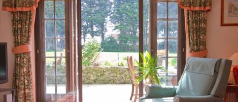 Cottage, 3 Bedrooms | Living area | Flat-screen TV, iPod dock