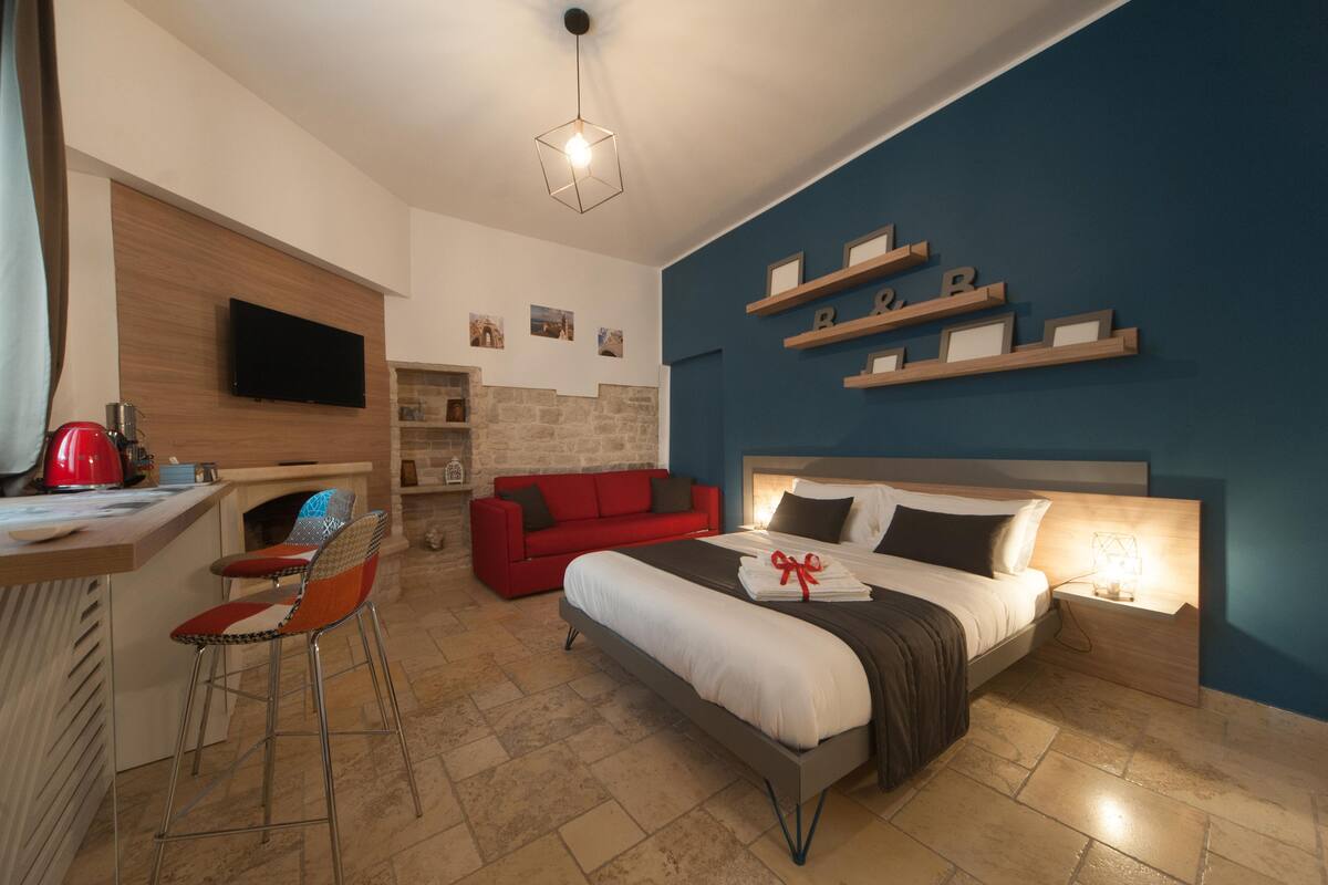 Quarto quádruplo família (Family Room) | Cofres nos quartos, cortinas blackout, Wi-Fi de cortesia, roupa de cama
