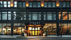 A modern building with a large glass facade, the name "KINLEY" prominently displayed above the entrance. - Kinley Cincinnati Downtown, a Tribute Portfolio Hotel (Cincinnati)