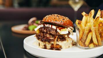 A plate with a burger and fries.