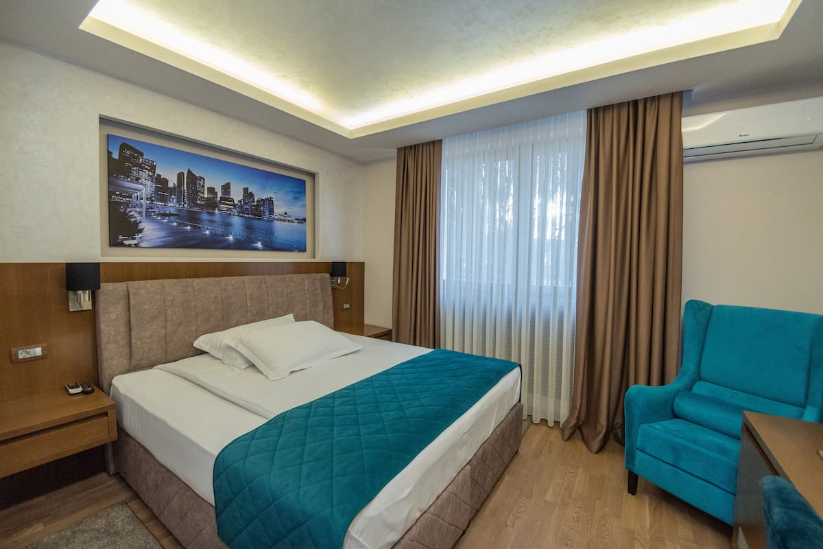 Chambre Supérieure, 1 trÚs grand lit