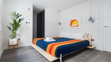 3 habitaciones, tabla de planchar con plancha, wifi y ropa de cama