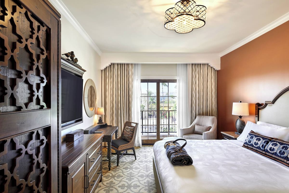 Room, 1 King Bed, Balcony | In-room safe, desk, laptop workspace, blackout drapes