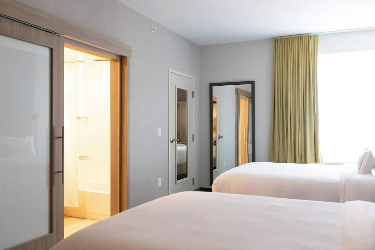 suite, multiple beds | in-room safe, desk, blackout curtains, iron/ironing board