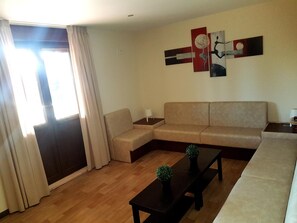 32-inch flat-screen TV with cable channels, TV