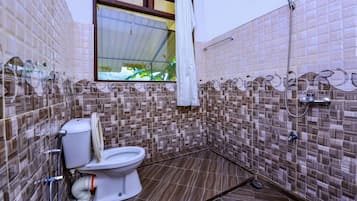 Shower, rainfall showerhead, towels