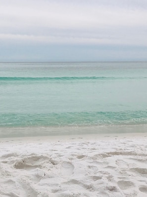 On the beach, sun-loungers, beach towels