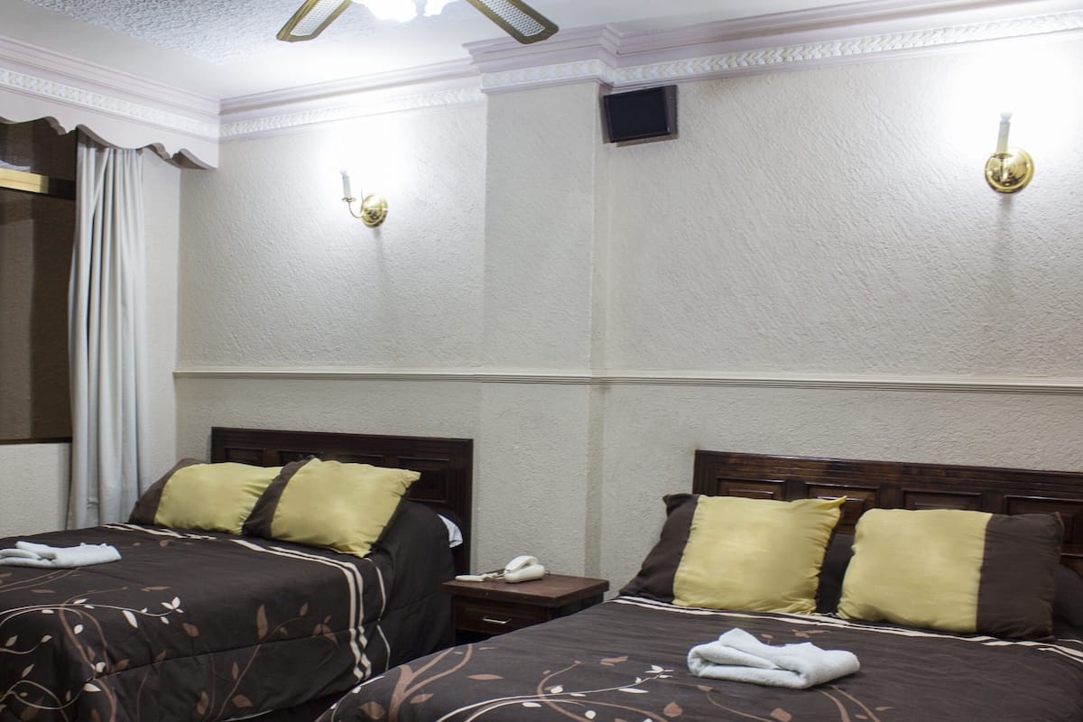 Economy Double Room | Blackout curtains, iron/ironing board (on request), free WiFi