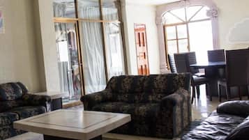 32-inch flat-screen TV with cable channels, TV