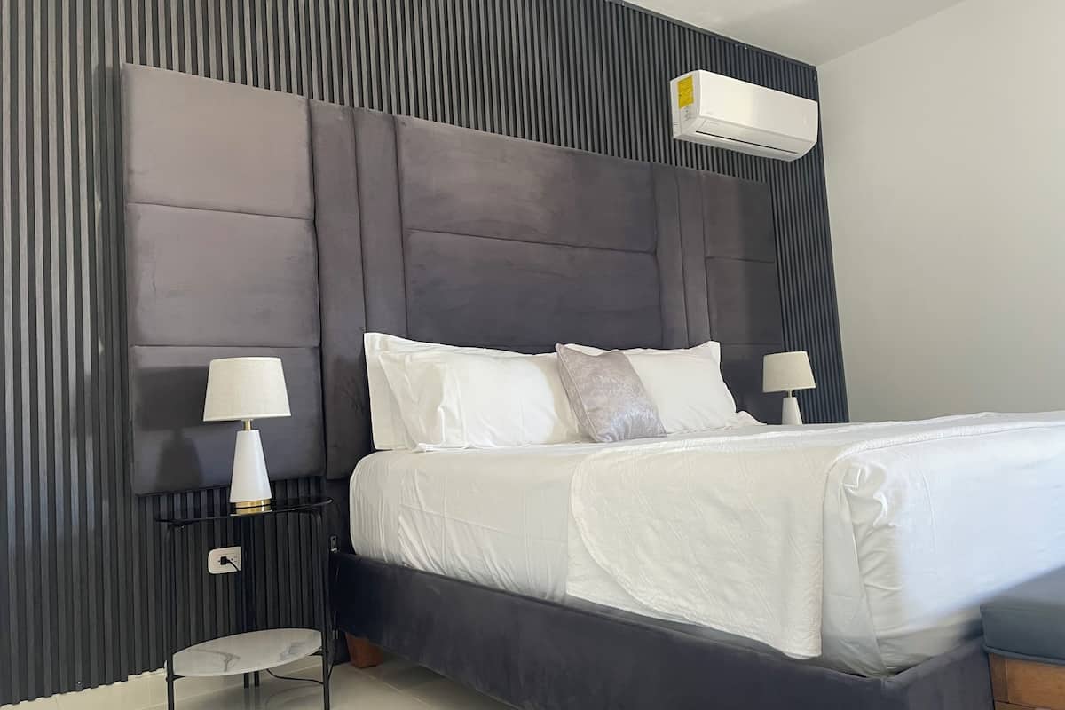 exclusive double room, 1 king bed, pool view | bathroom | shower, rainfall showerhead, free toiletries, hair dryer