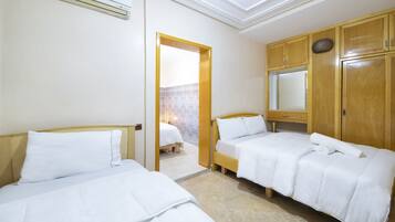 Chambre Quadruple | Rideaux occultants, Wi-Fi gratuit, draps fournis