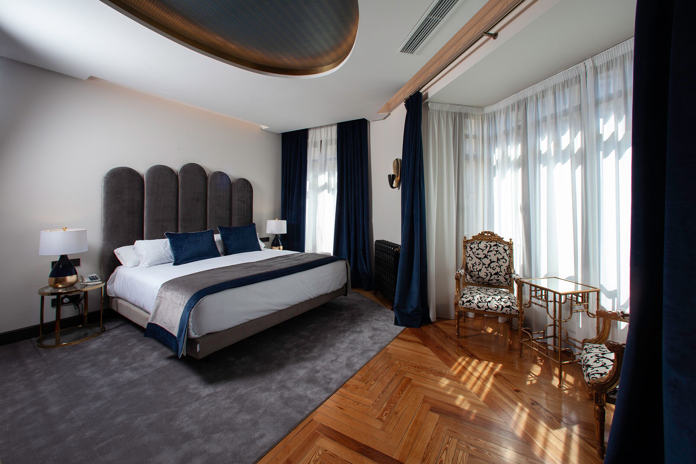 Deluxe Double Room | Minibar, in-room safe, individually decorated, individually furnished