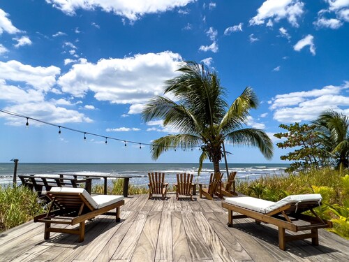 A true beachfront home on a surf break