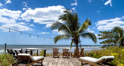 A true beachfront home on a surf break