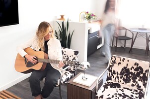 Deluxe Studio Suite | Living area | 55-inch Smart TV with digital channels, TV, Netflix