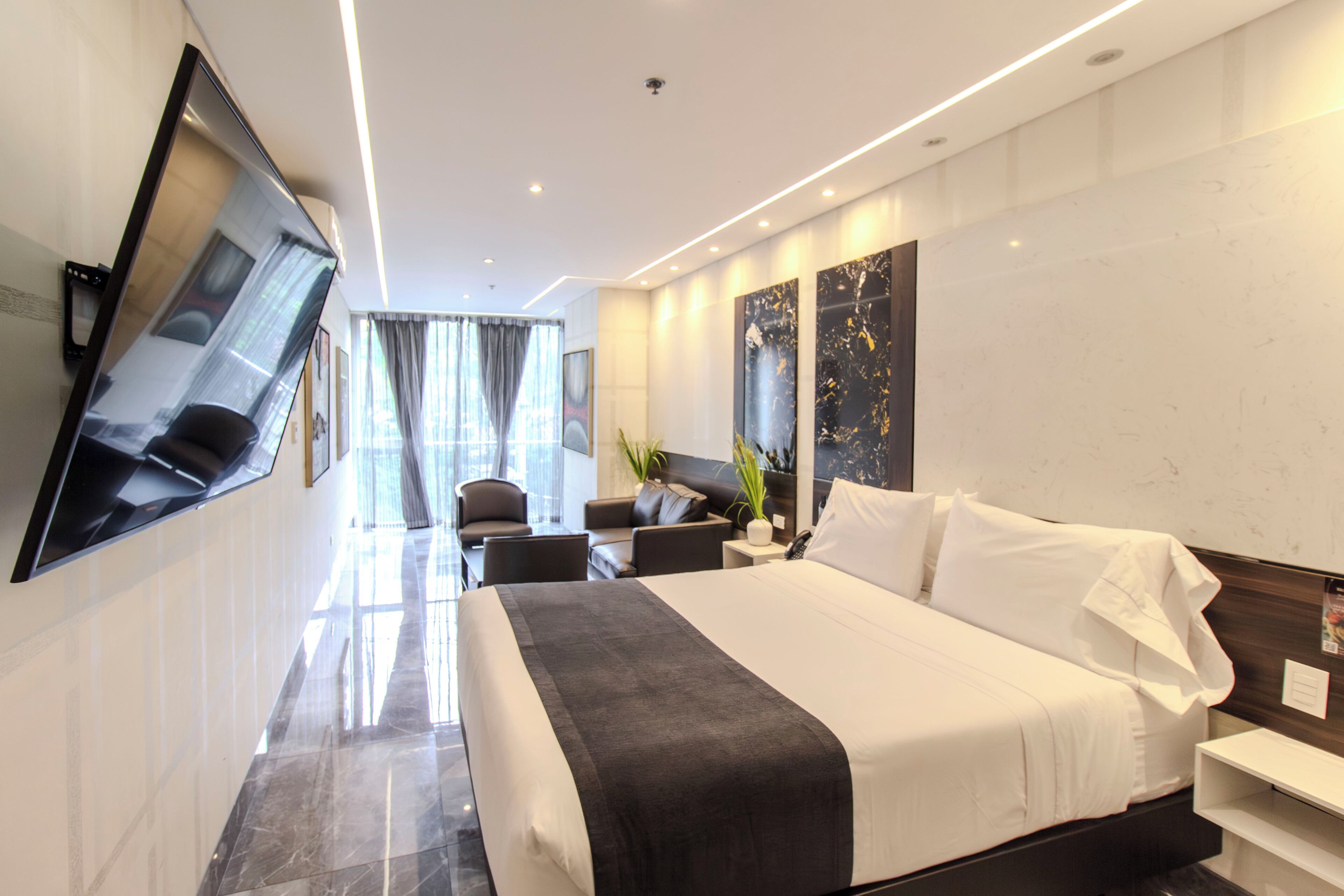 Superior Room with Lounge Area | In-room safe, individually decorated, individually furnished