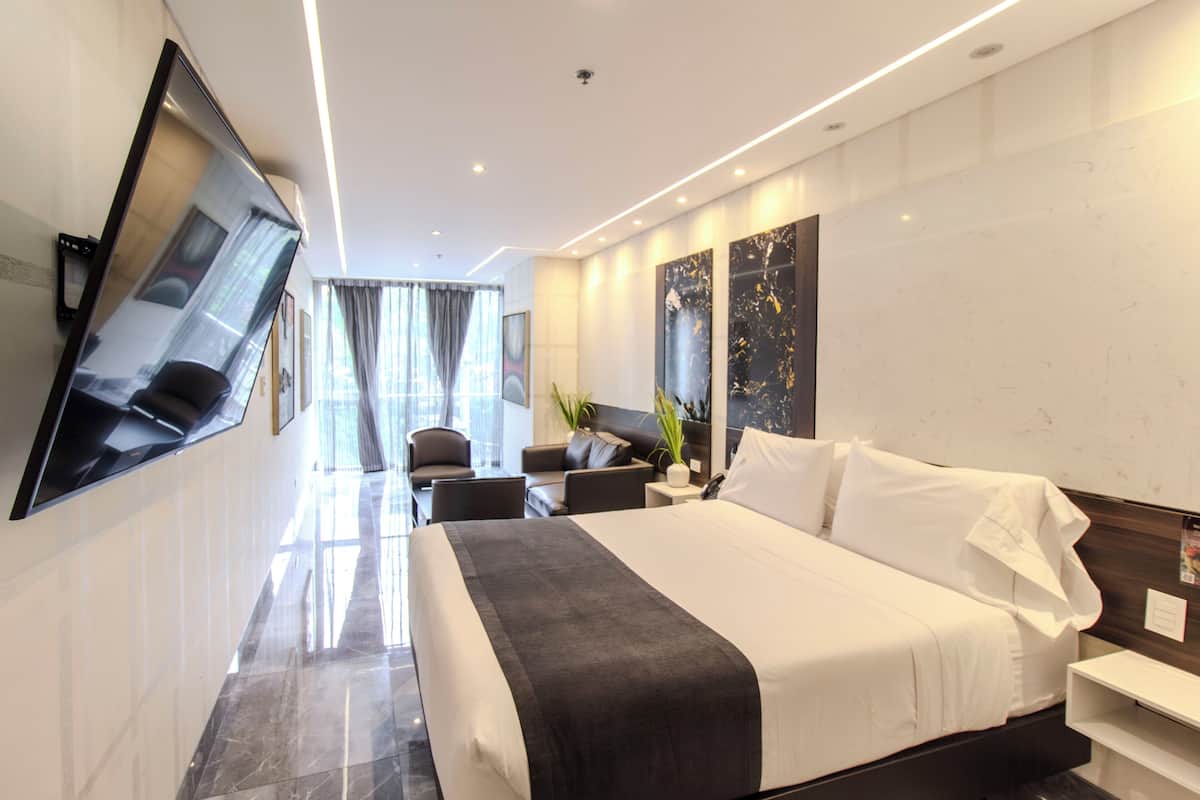 Superior Room with Lounge Area | In-room safe, individually decorated, individually furnished