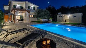 A modern two-story house with a swimming pool, outdoor seating, and a pergola. - VILLA ROKO with 4 bedrooms, 32sqm heated pool, playground (Tugare)