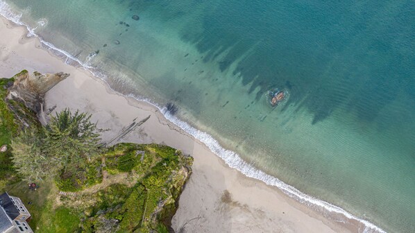 On the beach, sun-loungers, beach umbrellas, beach towels