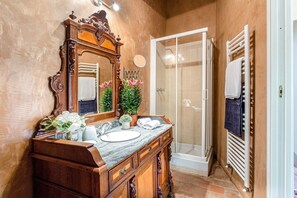 Bathtub, hair dryer, towels