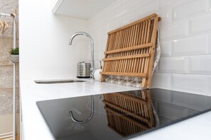 Dutxa, assecador de cabells, tovalloles i sabó 