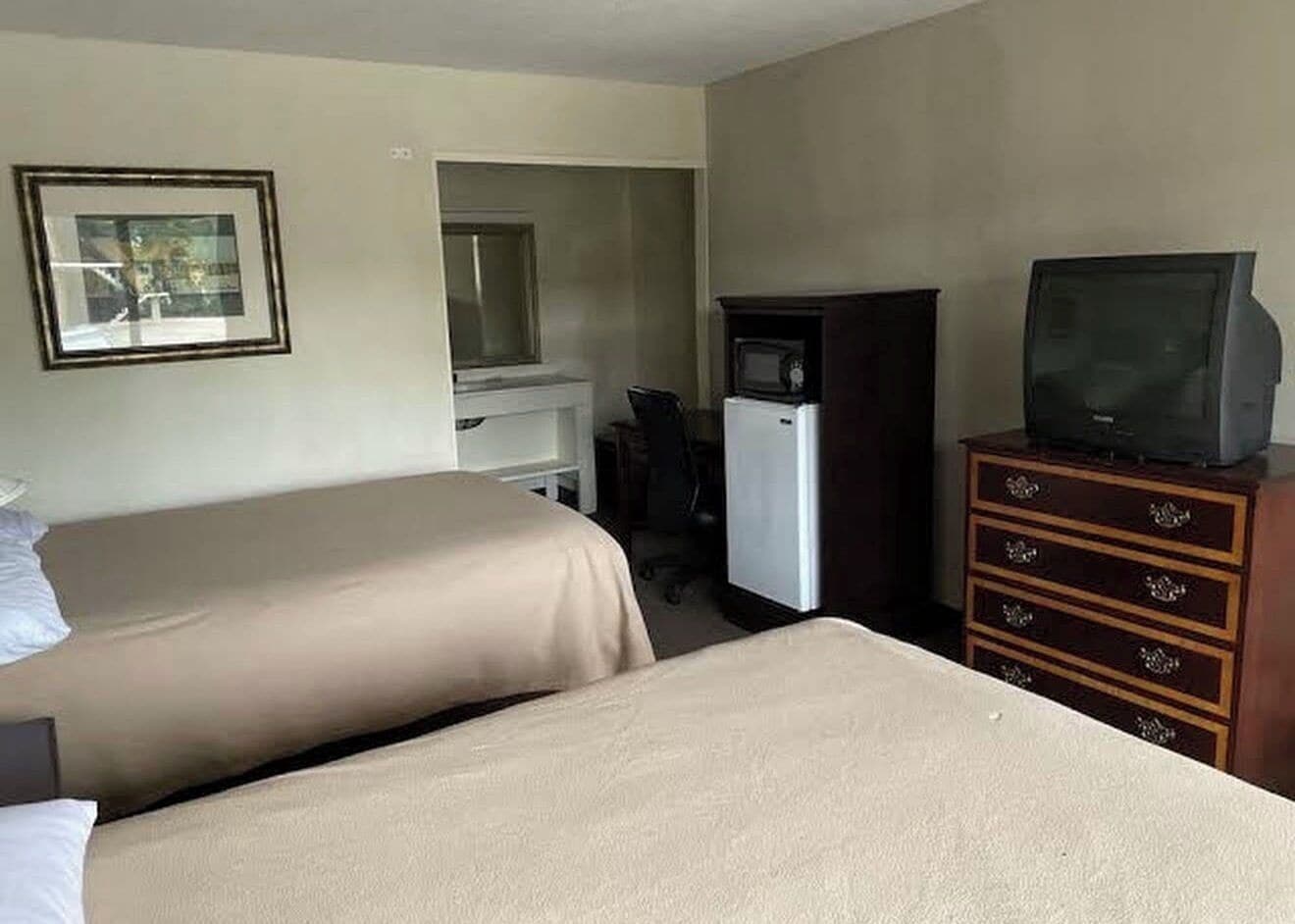 Desk, laptop workspace, free WiFi, bed sheets