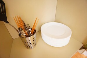 Fridge, microwave, stovetop, cookware/dishes/utensils