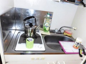 Fridge, microwave, stovetop, cookware/dishes/utensils