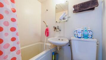 Hair dryer, towels, soap, shampoo